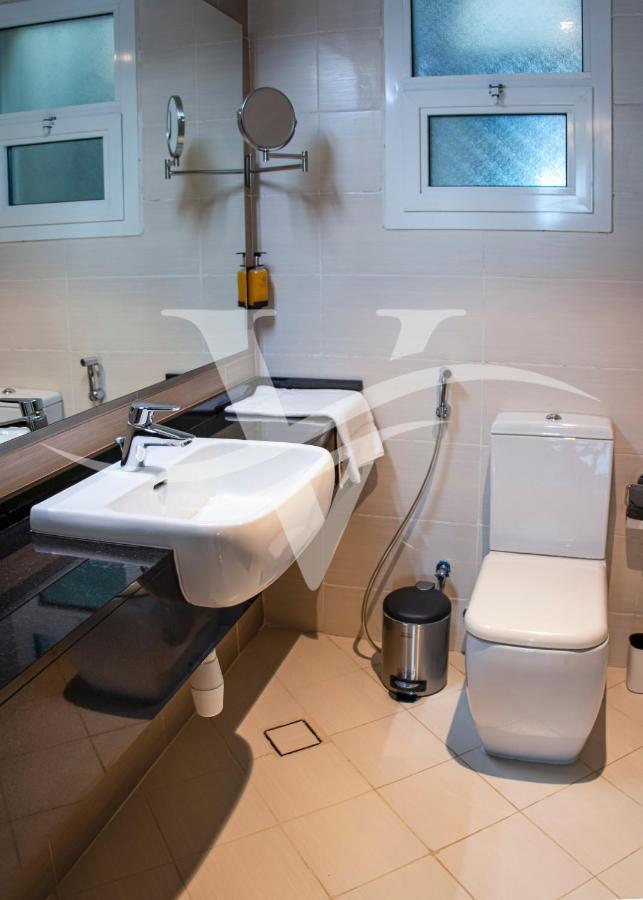 Viola Hotel Apartments Шарджа Екстериор снимка
