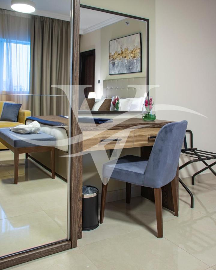 Viola Hotel Apartments Шарджа Екстериор снимка