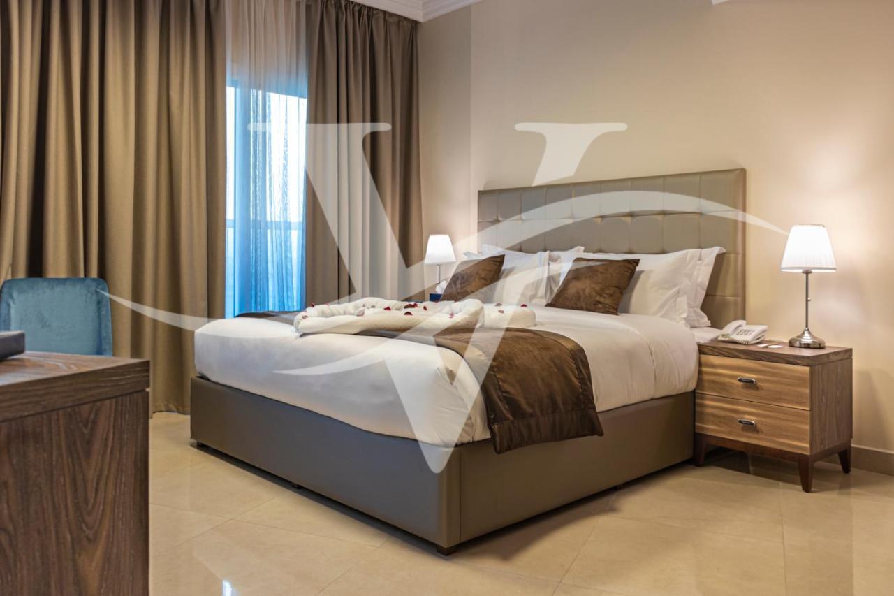 Viola Hotel Apartments Шарджа Екстериор снимка