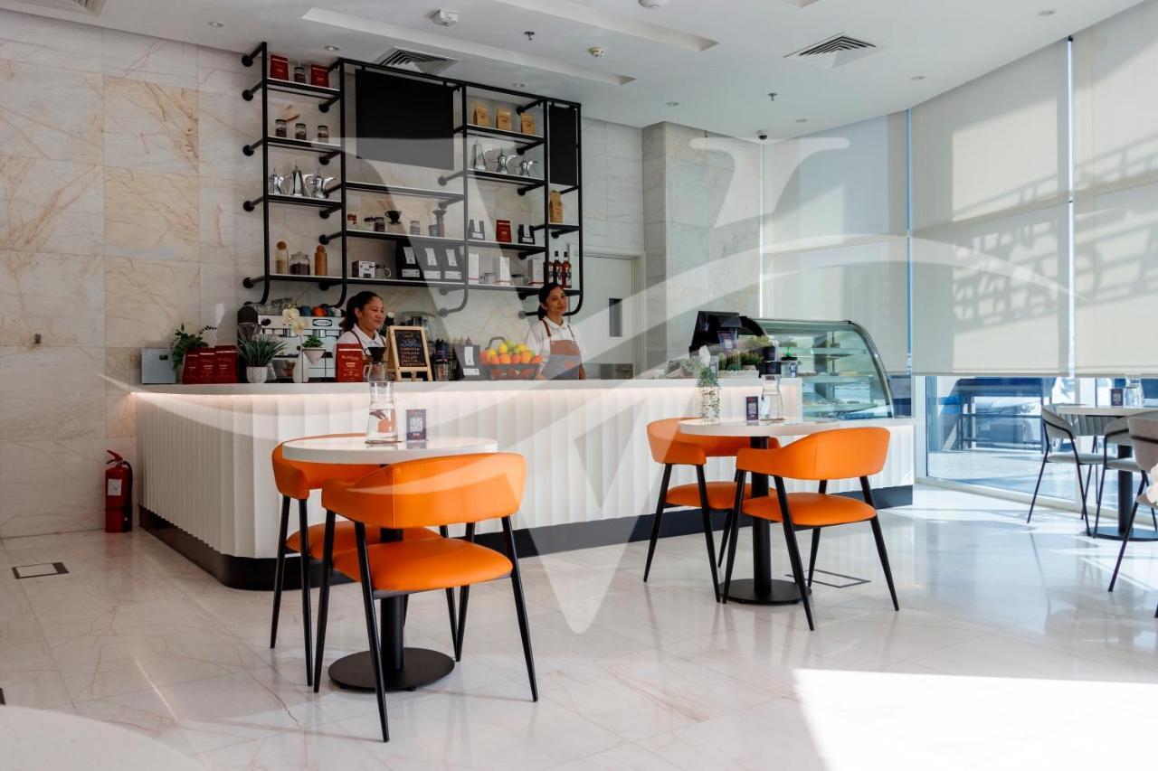Viola Hotel Apartments Шарджа Екстериор снимка